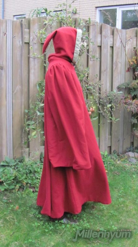 worn gardecorpse with the hood up from the side