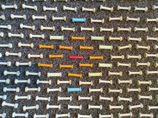 spools on the floor in a pattern - close-up
