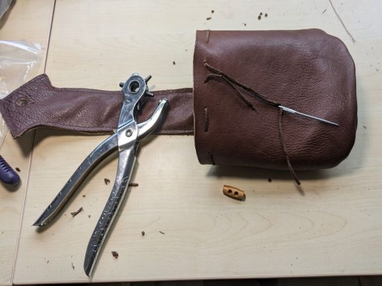 punching holes in the bag