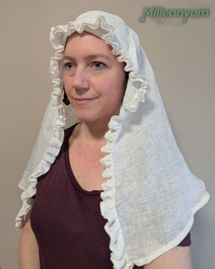 me wearing the ruffled veil